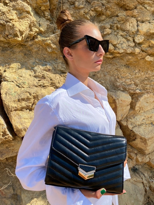 Sort quiltet crossbody-taske til damer
