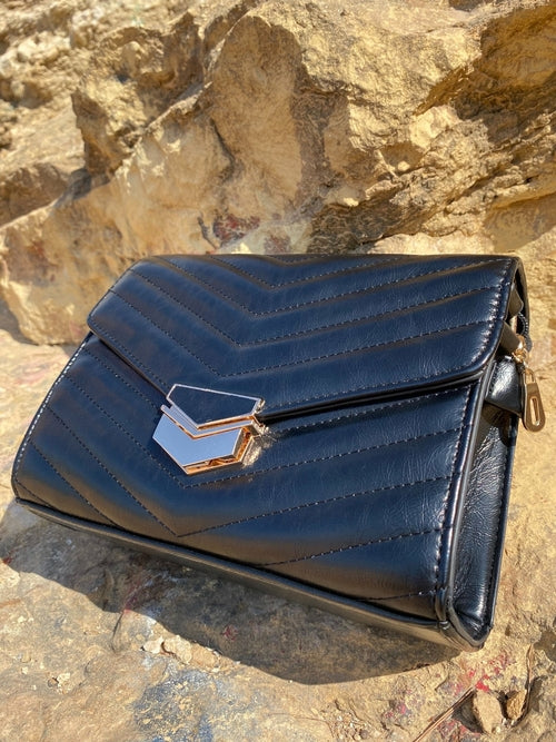 Sort quiltet crossbody-taske til damer