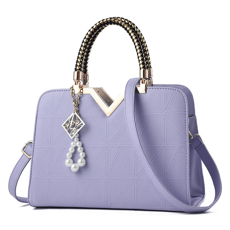 Rummelig håndtaske til damer – skulder og crossbody